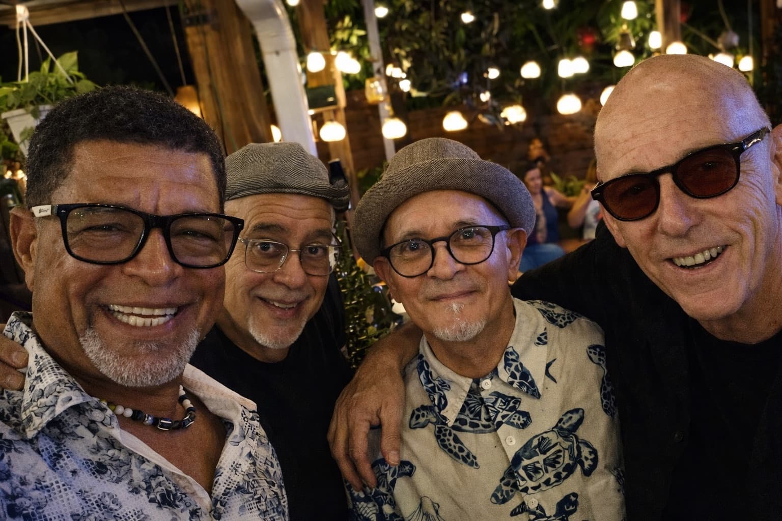 Friends smiling and enjoying Zaco's Tacos